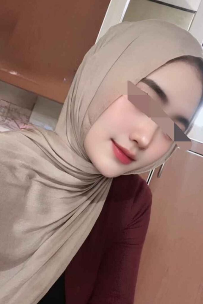 Malay woman in hijab with red lipstick. Amina, 22yo Local Malay Escort KL