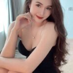 KL escort call girl in black dress