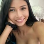 KL escort call girl smiling, close-up portrait